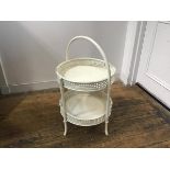A bamboo and rattan circular two tier tea ceremony stand with loop handle to top (h.74cm (