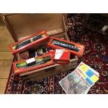 A pine box containing a collection of Tri-ang Hornby 00 rolling stock including Great Western