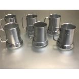 A set of six aluminium American Playboy Bunny engraved tankards with glass bases (h.12cm d.9cm)