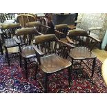 A set of six mahogany spindle back captain style chairs by W Walker & Son, Bunhill Row, London, with