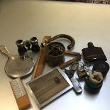 A collection including a brass chamber candlestick, two rules, a plated mirror, a penknife, a pocket