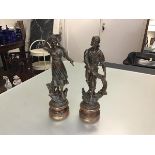 A pair of 19thc bronzed spelter figures, Pecheur and Pecheuse, raised on turned bases (h.39cm,