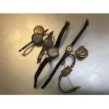 A collection of vintage lady's wristwatches: a lady's 9ct gold wristwatch with silvered dial and