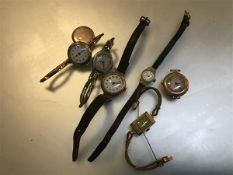 A collection of vintage lady's wristwatches: a lady's 9ct gold wristwatch with silvered dial and