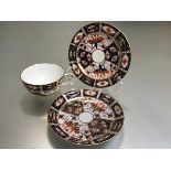 A Royal Crown Derby pattern 2451, Imari coffee can, saucer and side plate (12cm)