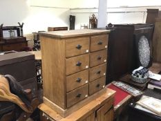 A reclaimed pine style chest, the rectangular top with moulded edge, fitted two banks of four