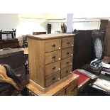 A reclaimed pine style chest, the rectangular top with moulded edge, fitted two banks of four