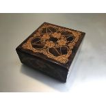 A treen Art Nouveau decorated pokerwork box with stylised floral interlocking decoration (7cm x