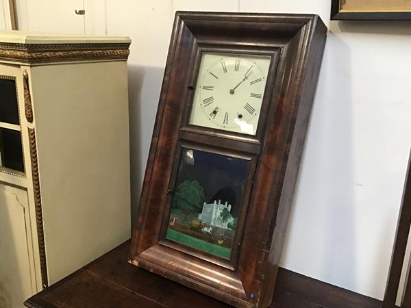 A 19thc Jerome & Co. New Savec, Connecticut, eight day clock with enamelled dial and eglomise panel,