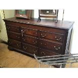 A George III mahogany crossbanded oak mule chest, the hinged rectangular top with moulded edge