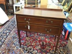 An Edwardian mahogany ledgeback chest, the top with crossbanded chequerboard inlaid border above two