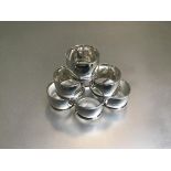 A set of six Birmingham silver plain bombe style napkin rings (179g)