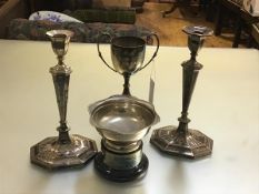 A pair of Edwardian Sheffield plated octagonal candlesticks (one missing drip tray), with family