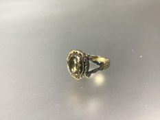 A 19thc yellow metal ring set oval cut foiled citrine (Q) (3.65g)