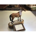 A Royal Worcester limited edition porcelain model of Arkle, owned by the Duchess of Westminster,