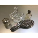A Birmingham silver mounted crystal hairpin holder, a silver topped crystal circular scent bottle (