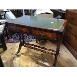 A reproduction mahogany sofa table, the rectangular top with inset green leather gilt tooled skiver,