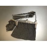 A Chester silver handled button hook and shoe horn, a white metal lady's chainmail purse complete