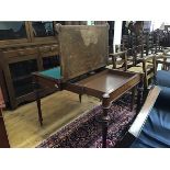 A Victorian figured walnut shaped top foldover card table, the top (a/f) with crossbanded border and