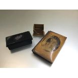 A mauchline ware treen minature stationery rack with a transfer print of Inverarie Castle, a