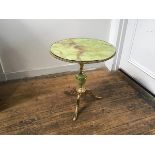 A 1960s brass plated metal faux onyx pedestal table on brass plated tripod support (h.56cm x d.