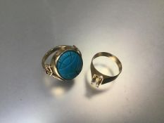 A yellow metal turquoise scarab style ring (9.28g) (Q) and a yellow metal solitaire style ring (3.