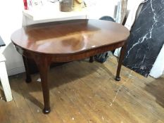 A Whytock & Reid mahogany wind out dining table, c.1920/30, the D end moulded top above a plain
