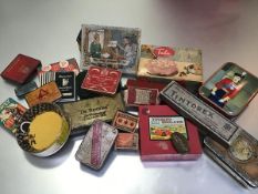 A collection of tins including Marcovitch Black & White Cigarettes, Pastilles, Touring England etc.