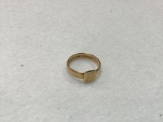 An 18ct gold signet style ring with engraved cypher HI, dated 6.6.1935 (5.59g)