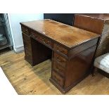 A Holland & Sons, Mount Street, London, mahogany twin pedestal kneehole desk, the top with moulded