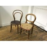 A late 19thc walnut child's hoop back chair with stuffover seat, on turned tapered splay supports