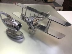 Aeronautical interest: a modern aluminium cast and polished model biplane and Rolls Royce style