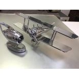 Aeronautical interest: a modern aluminium cast and polished model biplane and Rolls Royce style