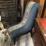 An Edwardian ebonised frame scroll back prie dieu style chair, with central tapestry back panel,