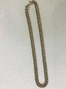 A 9ct gold double chain link necklace (l.20.5cm) (27.3g)