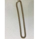 A 9ct gold double chain link necklace (l.20.5cm) (27.3g)