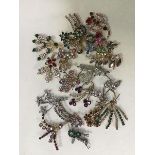 A collection of paste set floral spray brooches (a lot)