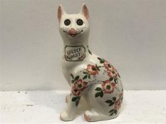 A Griselda Hill pottery Wemyss Galle style cat, decorated with briar rose design, signed verso (h.