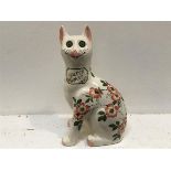 A Griselda Hill pottery Wemyss Galle style cat, decorated with briar rose design, signed verso (h.