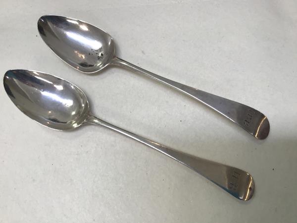A matched pair of George III table spoons, London 1796, Peter and Anne Bateman and other marks