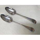 A matched pair of George III table spoons, London 1796, Peter and Anne Bateman and other marks