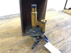 A 19thc bronze and brass mounted table microscope, Henry Crouch, London, no. 4500, complete with