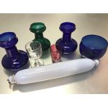 A collection of glass to include two Bristol blue glass hyacinth vases, a green glass hyacinth vase,