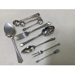 A group of miscellaneous silver flatware including a pair of Birmingham silver mustard spoons, a