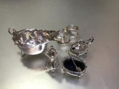 A Chester silver George III style sauceboat (h.5cm), an Epns three piece condiment set and two