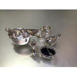 A Chester silver George III style sauceboat (h.5cm), an Epns three piece condiment set and two