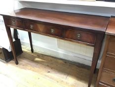 A reproduction mahogany side table, the rectangular top with crossbanded border above three frieze