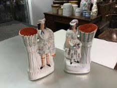 A pair of 19thc Staffordshire flatback figures, Princess Louise and Marquis of Lorne, decorated with