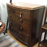 A 19thc figured walnut bow front chest, the top with moulded edge above two short and three