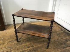 A 19thc rosewood two tier etagere raised on barley twist supports, with brass caps and castors (h.